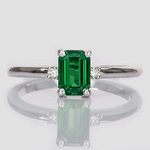 emerald-cut-tsavorite-and-diamond-trilogy-ring-lstr521